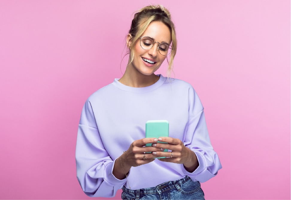 Image of a young adult reading a text message